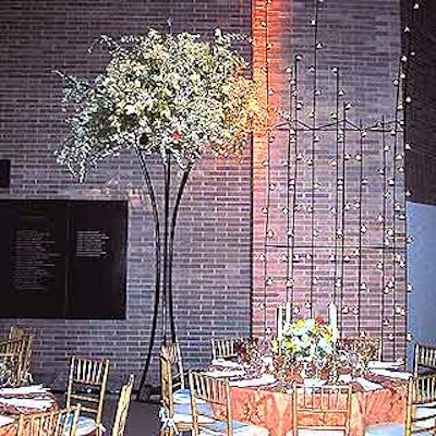 Sixteen-foot-tall candelabras stood against the pavilion's brick walls to help make the space cozy and intimate.