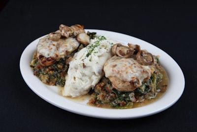 One of the restaurant's signature dishes is chicken Sinatra, topped with mushrooms and provolone cheese and served atop greens sauteed with hot peppers.