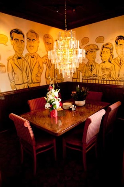 The Godfather Room is an intimate space for as many as eight people, surrounded by life-size caricatures.
