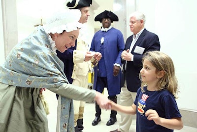 Historical reenactors greeted the families of guests at the Promise of America breakfast early in the day.