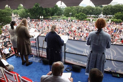 Historical reenactors dressed as John Adams, Benjamin Franklin, and Thomas Jefferson gave a dramatic reading of the Declaration.