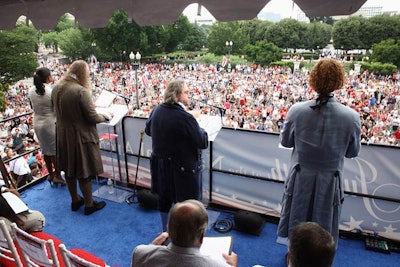 Historical reenactors dressed as John Adams, Benjamin Franklin, and Thomas Jefferson gave a dramatic reading of the Declaration.