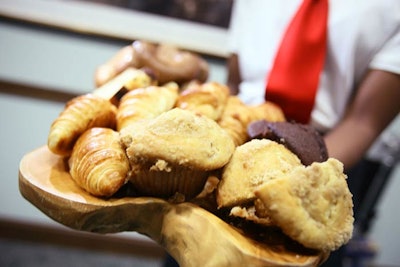 Breakfast also included an assortment of bakery items served on long wooden boards.