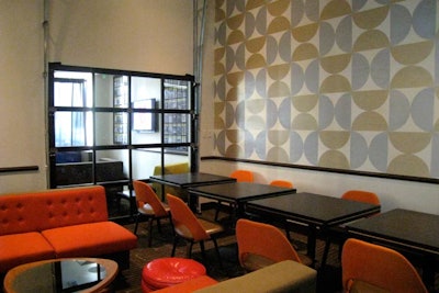 The red room accommodates 40 guests for a seated event or 60 for a reception.