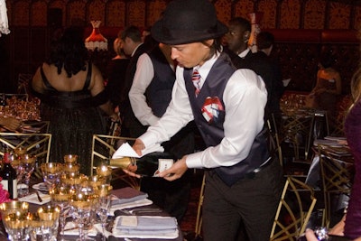 All 57 waiters wore bowler hats, Windsor knot ties with gold lion brooches, and Edwardian-styled waistcoats with gold Bafta masks printed on the back.