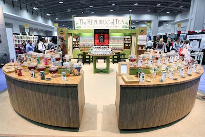 The Republic of Tea enlarged their feng shui-designed booth with two new sampling stations to accommodate 51 teas to try. All aspects of the booth construction, from the recycled jute padding under the renewable sisal carpeting, to the curved bamboo counters and energy-efficient lighting, promote the company’s eco-friendly image.