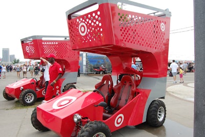 Publicizing the spread of Target stores to Canada, brand ambassadors passed out reusable bags from go-cart shopping carts.