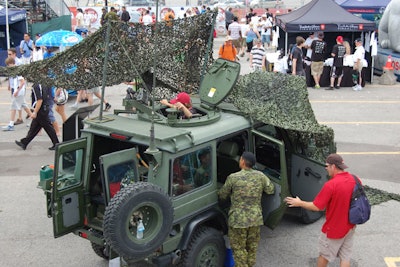 In an area reserved for the Canadian Forces, visitors were invited to explore military vehicles and equipment.