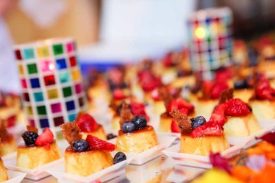 Cuba Libre Restaurant and Rum Bar served bite-size flan topped with strawberries and blueberries.