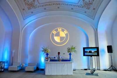 Hargrove set up white bars and lounge furniture for the publisher's reception and relied on lighting for color.