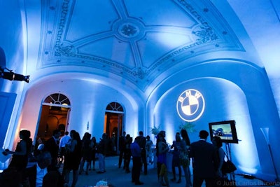 Blue lighting and BMW's logo added ambirnce to the publisher's V.I.P. reception, staged in one of the second-floor galleries of the museum.