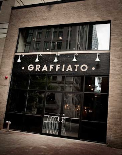 Floor-to-ceiling windows make up the facade of the restaurant.