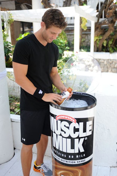 Large cylinders scattered around the event held Muscle Milk beverages.