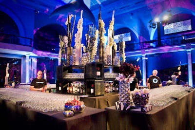 The four-sided bar featured custom black sparkle linens.