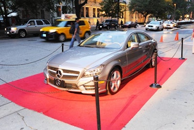 Sponsor Mercedes-Benz had a vehicle parked outside the hotel's entrance.
