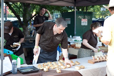 Sepia chef Andrew Zimmerman prepared buffalo chicken sausage; pastry chef Cindy Schuman made angel food cake with sweet and spicy peach salsa.