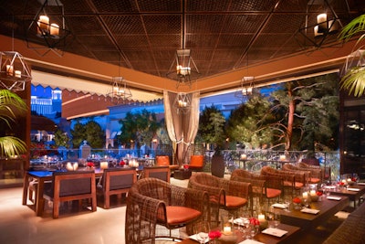 La Cave Wine & Food Hideaway inside Wynn Las Vegas has a garden lounge that recalls an oversize living room, with mix-and-match custom-made chairs and tables.