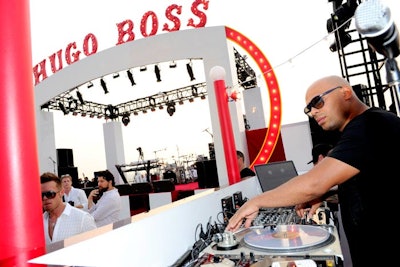 The largest design component was an impressive marquee over the main stage. The curved, red and white piece included the logo of Hugo Boss refashioned in a circus-style font.