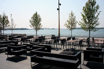 The 204-seat patio at Against the Grain has an unobstructed view of Lake Ontario. Couches and fire pits are available for groups.