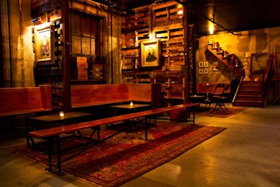 Wooden pallets separate each seating area at Goodnight, a reservations-only, speakeasy lounge.