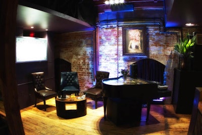 In the historic Distillery District, the Stirling Room maintained its Victorian charm, with exposed brick walls, leather chairs, and hanging portraits.