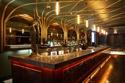 The Roosevelt Room incorporates an Art Deco aesthetic, with a paneled, diamond granite bar.