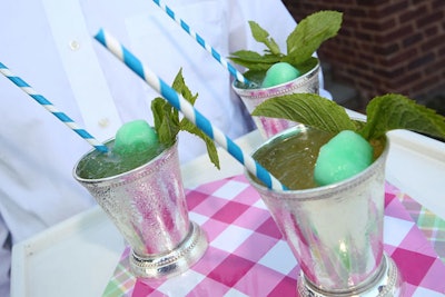Waiters passed mint julep snow cones served in the drink's signature glass.