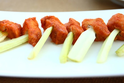 For a new take on buffalo chicken, chefs served the meat in cubes atop celery spears.