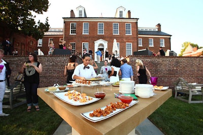 Design Cuisine set up a food station in the center of the lower garden behind the house.