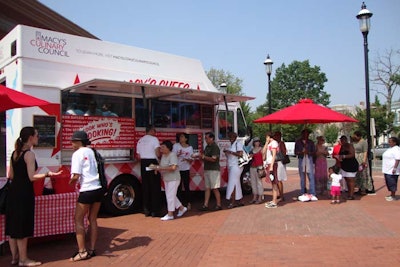 Washingtonians lined up to meet chef Marcus Samuelsson of Iron Chef and taste his cuisine.