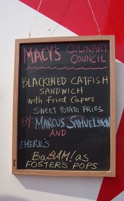 A chalkboard menu on the side of the truck showcased the day's dish at each city.