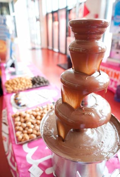 A dessert station offered chocolate-dipped treats.