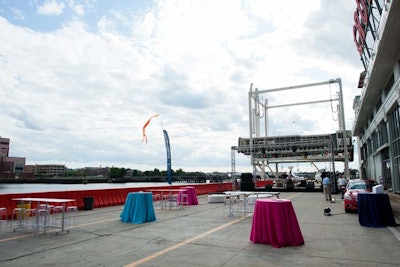 Petersons Party Center 's bright linens dressed up highboy tables stationed outside.