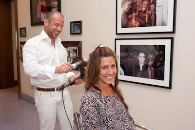 Designed to be intimate, the pop-up parties usually host between 30 and 40 guests. With blowouts, braiding, makeup stations, and a photo booth, the salon event on Wednesday hosted 75, a few more than usual.