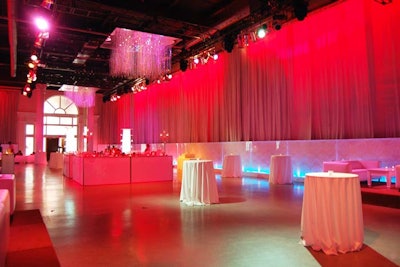 The cocktail hour and after-party took place in the colourful Artifacts Room, where ESG Show Services uplit the walls in pink and red.