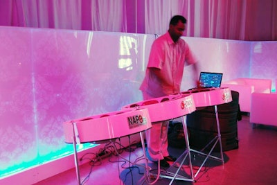 A musician played the e-pan, an electronic version of the steel drum, during the cocktail hour.