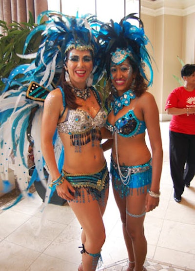 Models in traditional feathered and sequined carnival costumes added colour to the dining room.