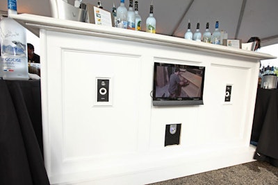 One of the raffle prizes was a custom bar with a built-in flat-screen TV, which served as a Grey Goose martini station during the event.