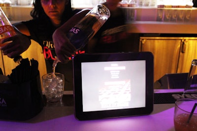At the bars, iPads displayed the evening's two specialty cocktails, while postcards played up the walk of shame kit's 'rate my date' cards.