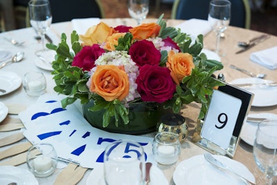 Each dinner table held paddles to help guests bid in the live auction.