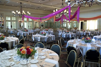 Pink and orange drapes from DK Floral Events spruced up the dining room.