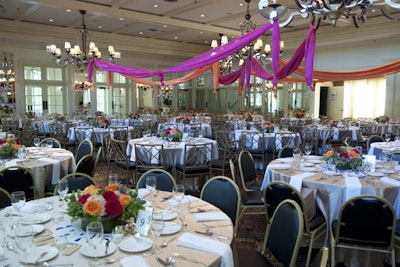 Pink and orange drapes from DK Floral Events spruced up the dining room.