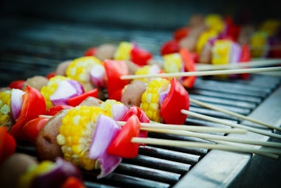 On the patio, two barbecues were fired up for vegetable and beef skewers.