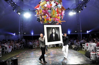Auctioneer Simon de Pury negotiated a fierce bidding war over Marina Abramović's striking self portrait, one of a handful of big-ticket live auction items to be sold during the evening's dinner portion.