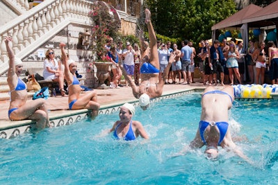 The Aqualillies did a synchronized swim routine at the pool party.