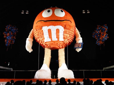 Inside the 69th Regiment Armory on Thursday, Mars Chocolate North America created a 46-foot-tall replica of its M&M's Pretzel 'spokescandy' Orange.