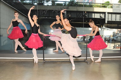 Dressed in black leotards and pink skirts, ballet dancers from the Bolshoi Ballet Academy posed in Milk Gallery's windows throughout the preview.