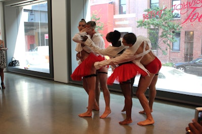 A quartet of dancers from the Stephen Petronio Company performed a piece titled 'Underland,' which includes a score of Nick Cave songs, in front of the gallery's north windows.