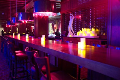 Candles and prop statues filled the Walnut Room, which housed bars, food stations, and the dance floor.