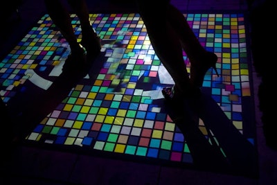 The Kia lounge also had a pixelated dance floor with shapes ranging from colored squares to bursting fireworks.